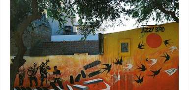 São Vicente: Blick auf die Streetart-Wand des Jazzy Birds in Mindelo